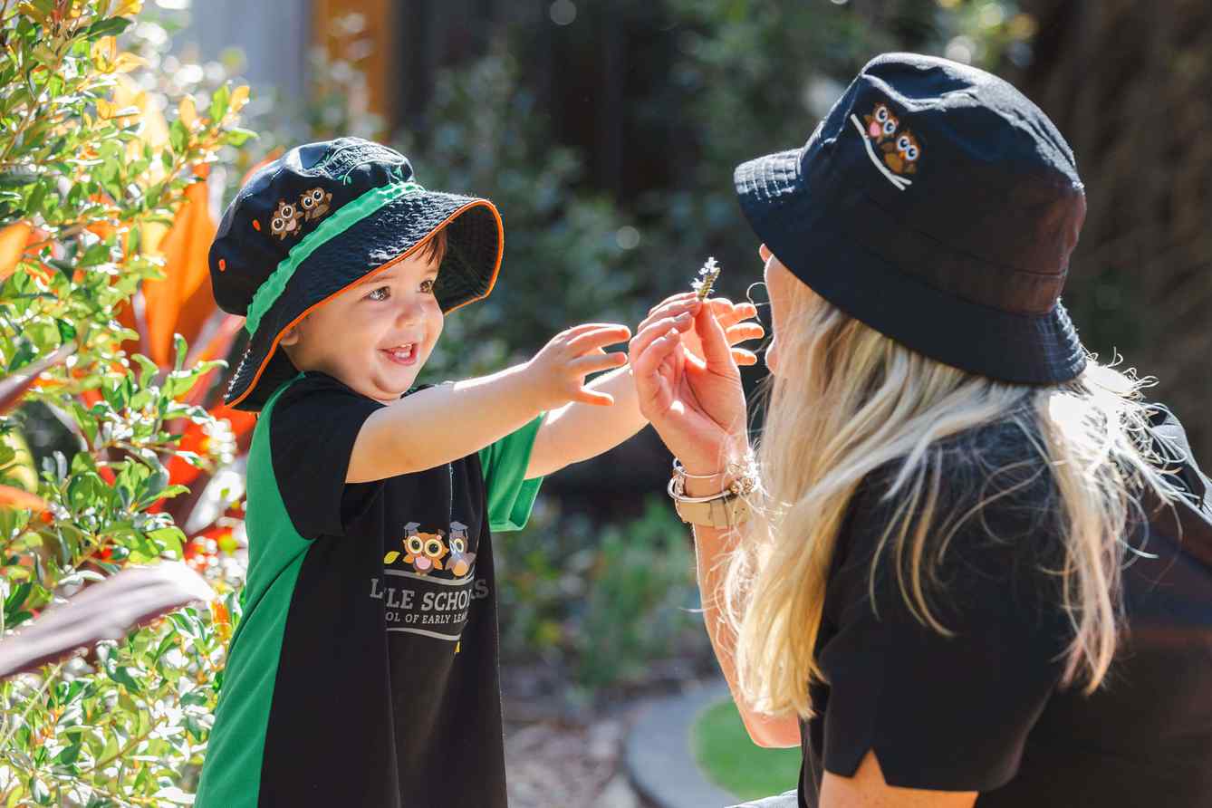 Nursery Early Learning Outdoor Sensory Play With Educator