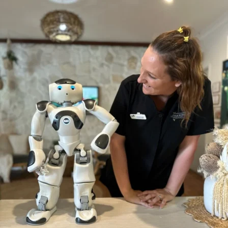 educator looking at robot toy at Little Scholars campus