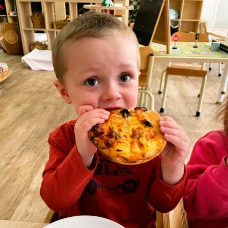 little scholar kids eating a cooky