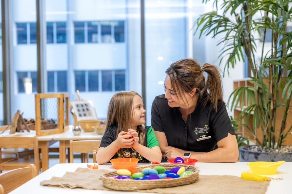 Toddler Learning Activity Daycare Teacher Interaction At Little Scholars