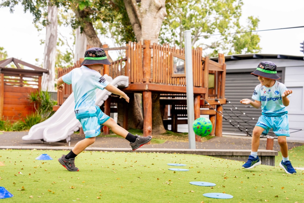 Children Playing Soccer Sport In Early Childhood Education