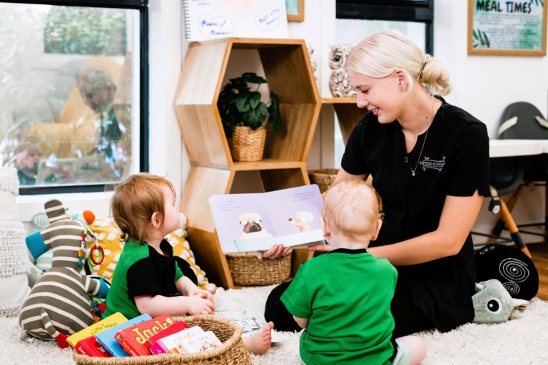Educator Interacting With Preschoolers Babies During Learning Activity