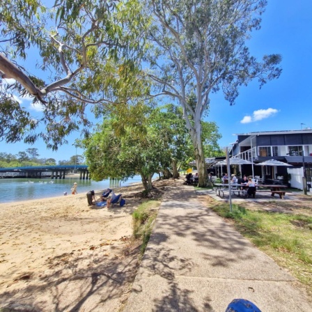 Calm Waters And Families Kayaking At Currumbin Creek Near Apex Park