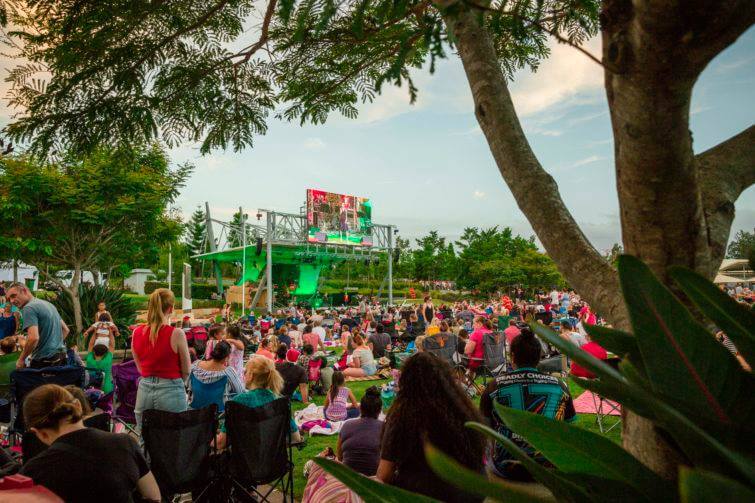 Families enjoying outdoor carols at Robelle Domain as part of Family Christmas Events Brisbane Gold Coast Ipswich
