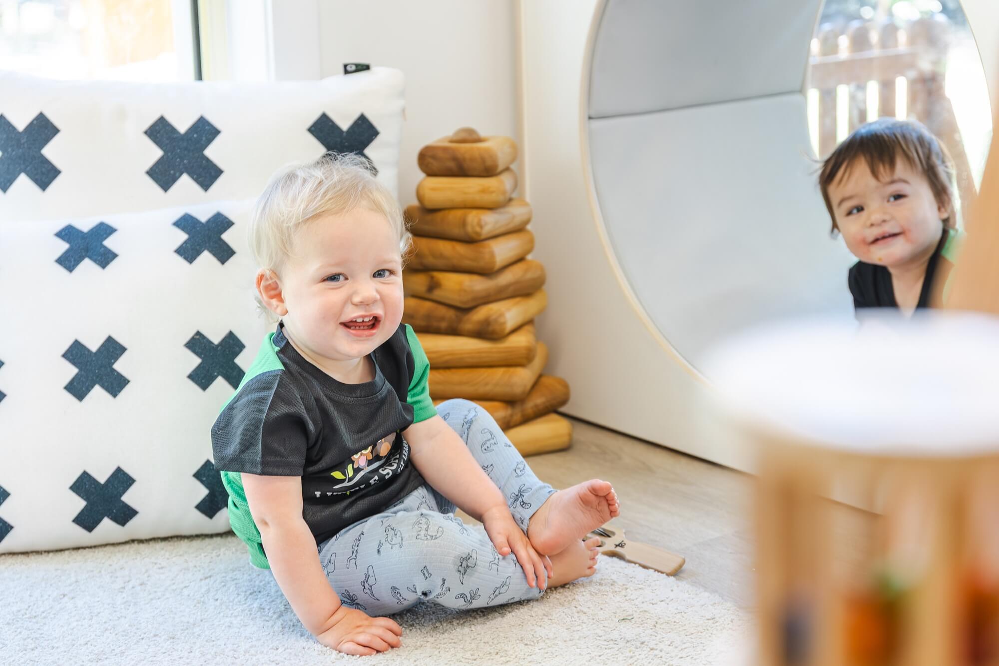 Little Scholars Smiling Babies In Infant Room Play Area