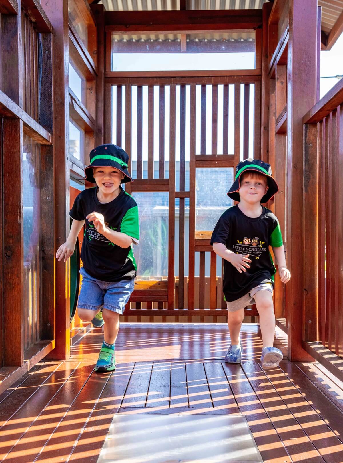 Children Running In Wooden Play Fort At Little Scholars Ormeau Village