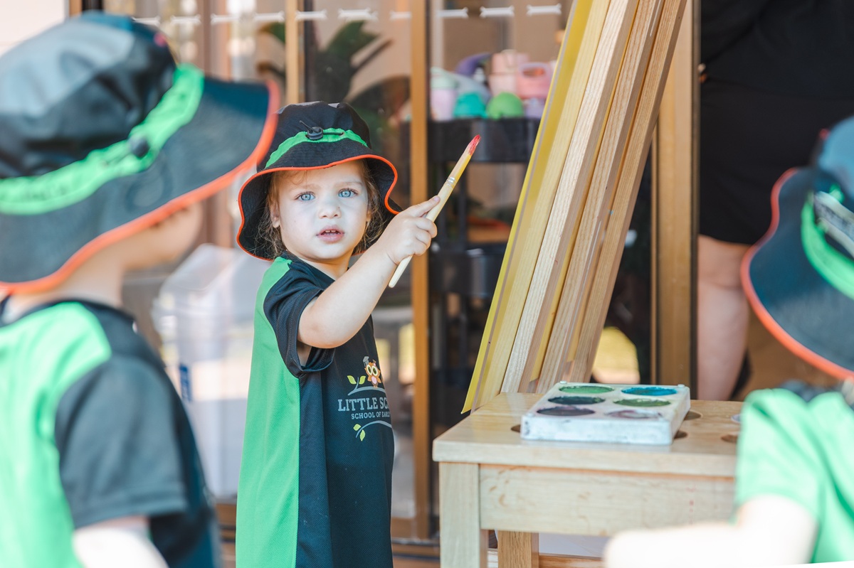 Toddler painting creative learning at Little Scholars